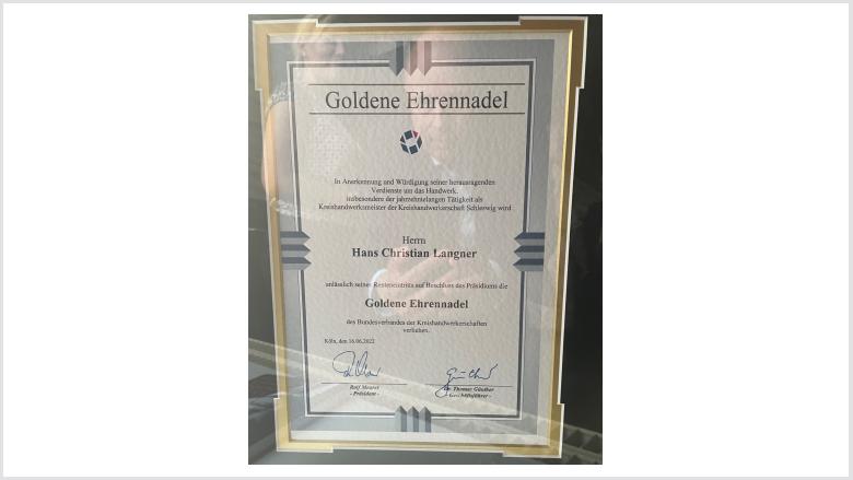 Goldene Ehrennadel für Hans-Christian Langner